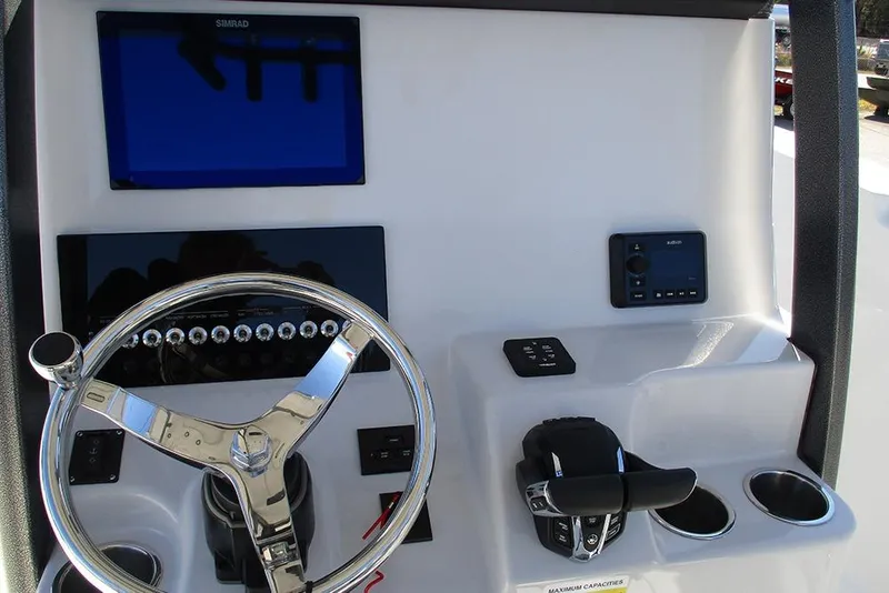 Slide: The Image of Steering console of 2026 Sea Pro 262 Offshore boat with modern controls and displays. - 39