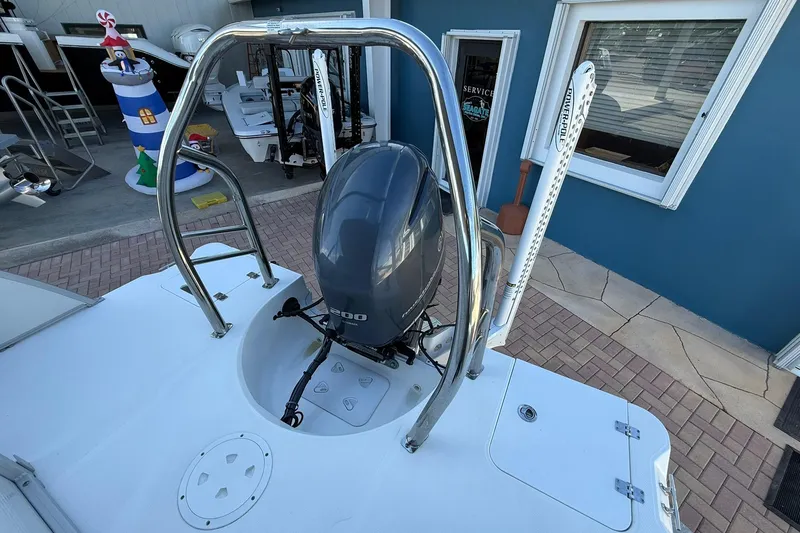 Slide: The Image of 2023 Hurricane FunDeck 2260 RE OB boat with outboard motor and stainless steel railing. - 8
