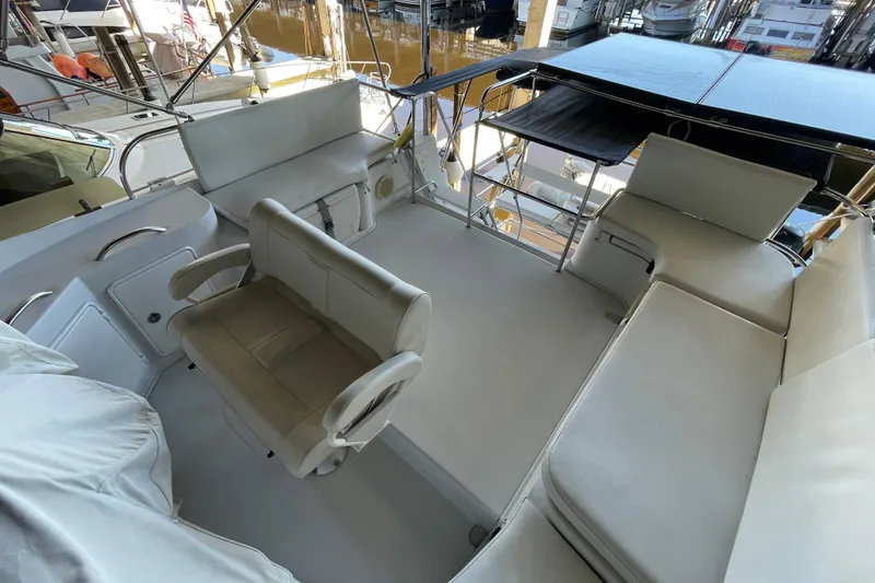 Slide: The Image of 2006 PDQ 34 Power Catamaran interior with spacious seating and modern design. - 16