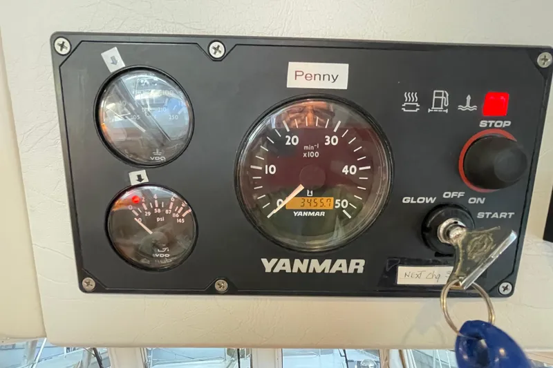 Slide: The Image of Control panel of a 2006 PDQ 34 Power Catamaran with Yanmar engine gauges. - 42