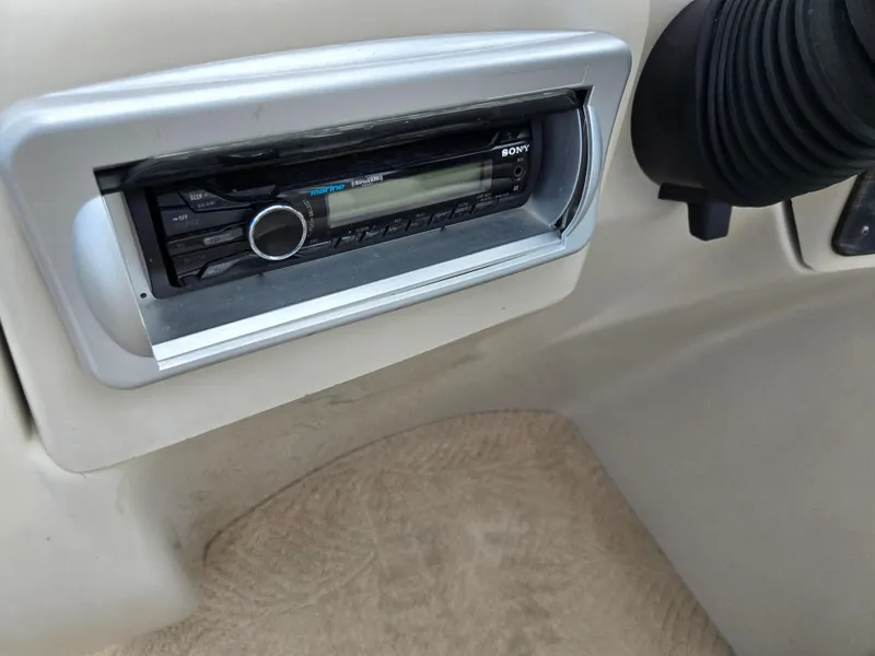 Slide: The Image of Sony marine stereo installed in a 2012 Sweetwater 2486 boat dashboard. - 22