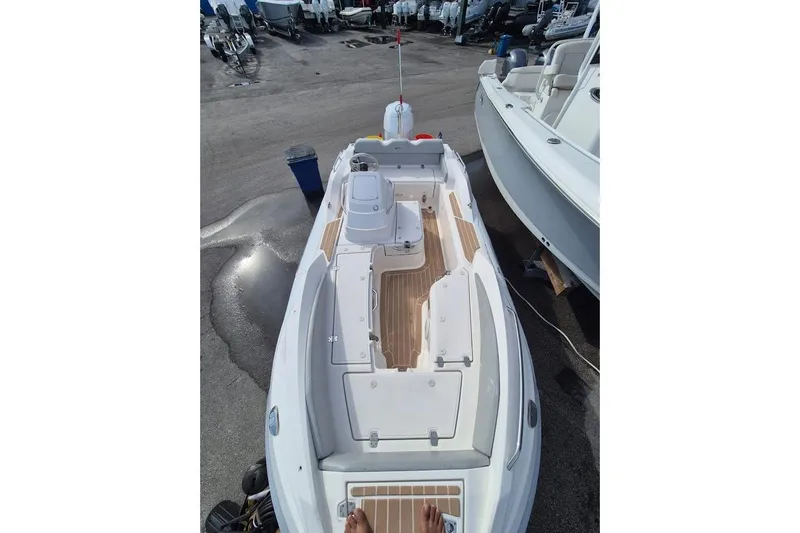 Slide: The Image of 2019 Zar Inflatable boat with wooden deck, docked in a marina. - 3