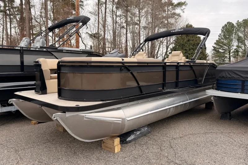 The Image of 2026 Veranda VR 235 L pontoon boat with beige seating, parked outdoors. - 1