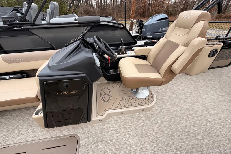 Slide: The Image of Captain's chair and console of 2026 Veranda VR 235 L pontoon boat. - 10