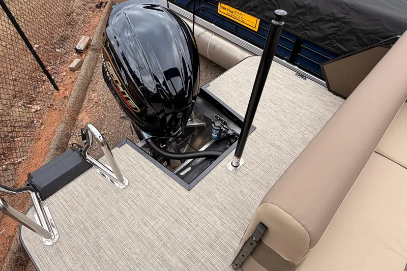 Slide: The Image of 2026 Veranda VR 235 L boat with outboard motor and swim ladder on deck. - 16