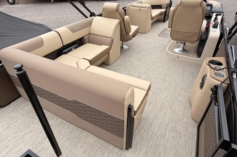 Slide: The Image of 2026 Veranda VR 235 L pontoon boat interior with beige seating and modern design. - 17
