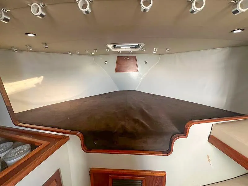 Slide: The Image of Interior of 1998 Jersey Cape 36 Express with wood trim. - 10