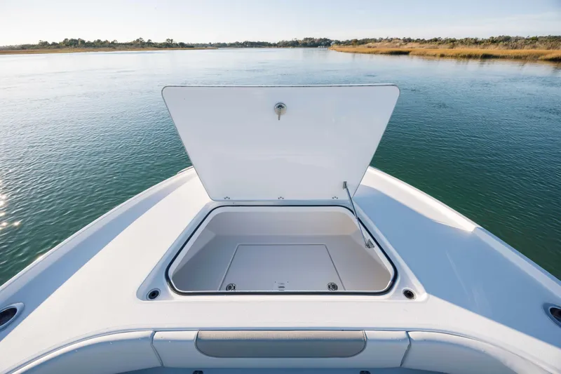 Slide: The Image of Open storage compartment on Caymas 26 HB boat, 2026 model. - 14