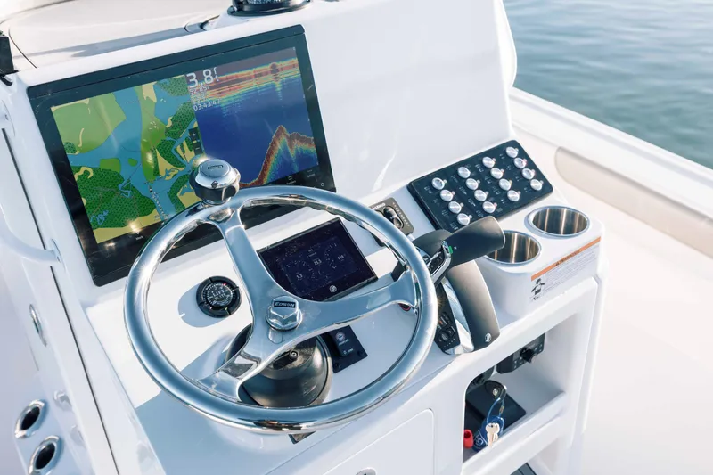 Slide: The Image of Caymas 26 HB 2026 helm with navigation system. - 22