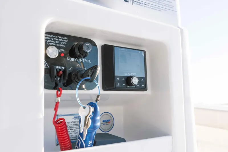 Slide: The Image of Caymas 26 HB 2026 boat control panel with RGB and JL Audio system. - 23