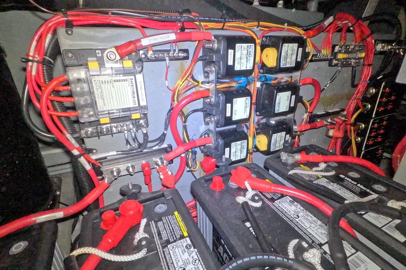 Slide: The Image of Electrical system of a 1995 Sea Ray 400 Express Cruiser with batteries and wiring. - 28