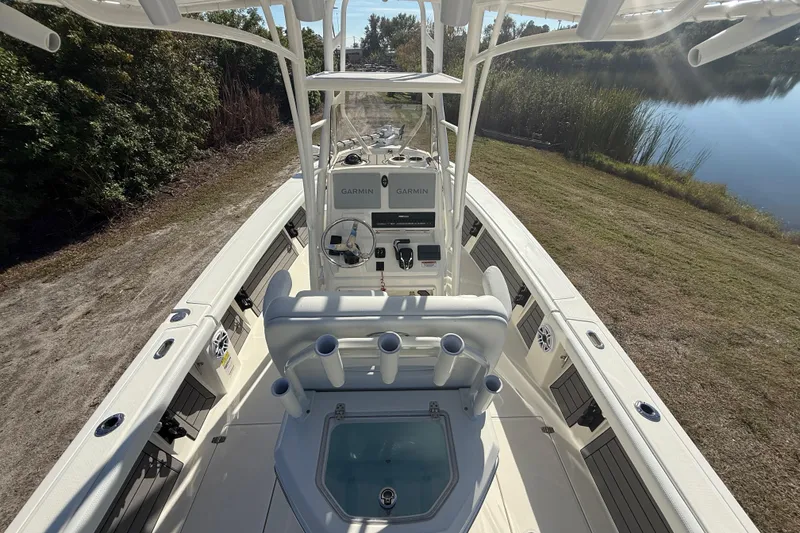 Slide: The Image of 2025 Pathfinder 2400 Open boat interior with advanced Garmin navigation system. - 14