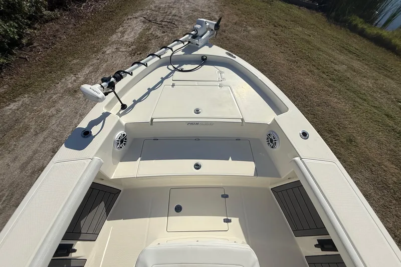 Slide: The Image of 2025 Pathfinder 2400 Open boat deck with trolling motor and storage compartments. - 22