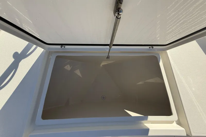 Slide: The Image of Open storage compartment on 2025 Pathfinder 2400 Open boat. - 51