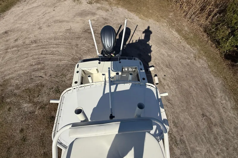 Slide: The Image of Aerial view of 2025 Pathfinder 2400 Open boat on sandy terrain. - 55