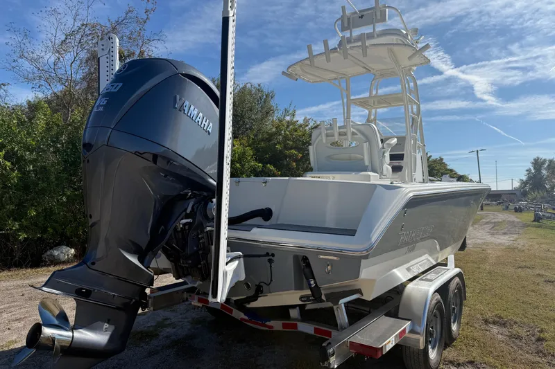 Slide: The Image of 2025 Pathfinder 2400 Open boat with Yamaha engine on trailer, outdoors. - 6