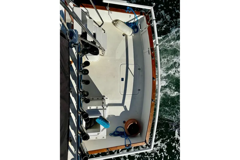 Slide: The Image of Aerial view of 1979 Californian 34 boat deck with ocean waves. - 19