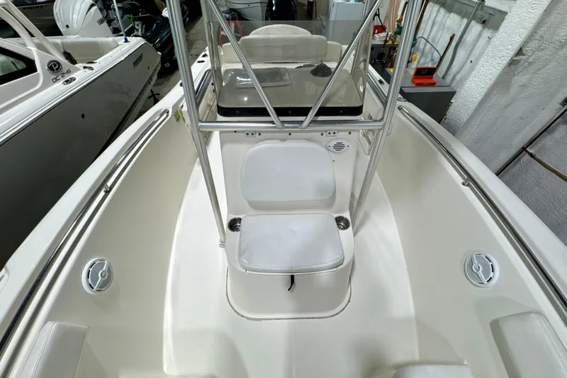 Slide: The Image of 2010 Trophy 2203 Center Console boat interior with seating and console view. - 12