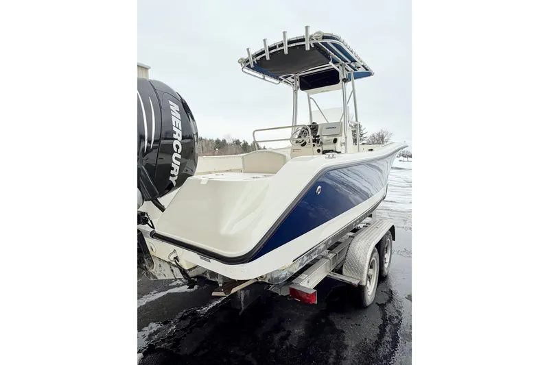 Slide: The Image of 2010 Trophy 2203 Center Console boat with Mercury engine on trailer. - 5