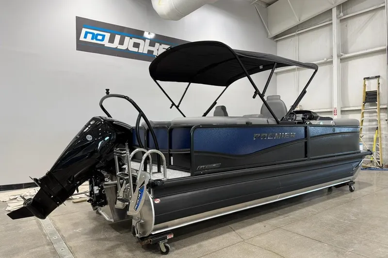 Slide: The Image of 2026 Premier 210 Sunsation RF-CL pontoon boat with canopy in showroom. - 4