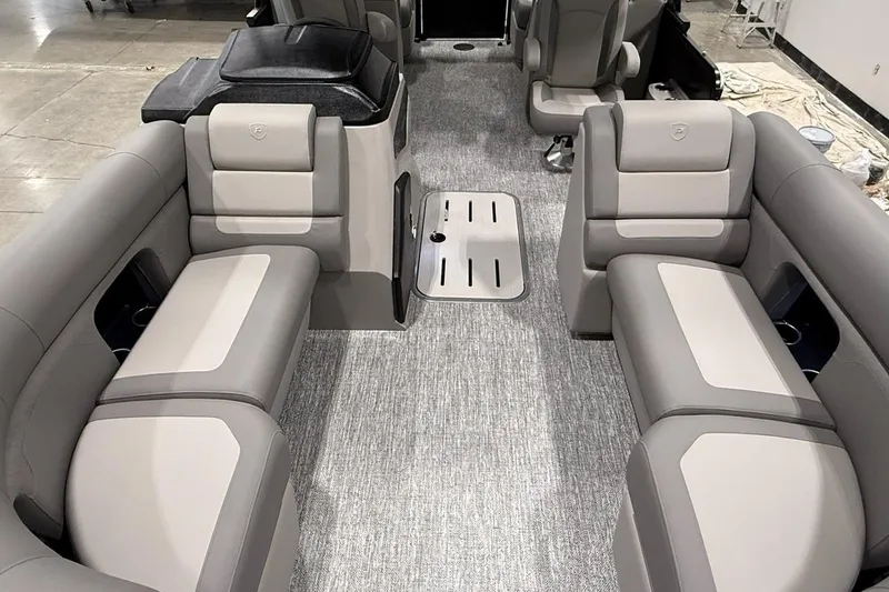 Slide: The Image of Interior of 2026 Premier 210 Sunsation RF-CL pontoon boat with gray seating and carpet. - 6