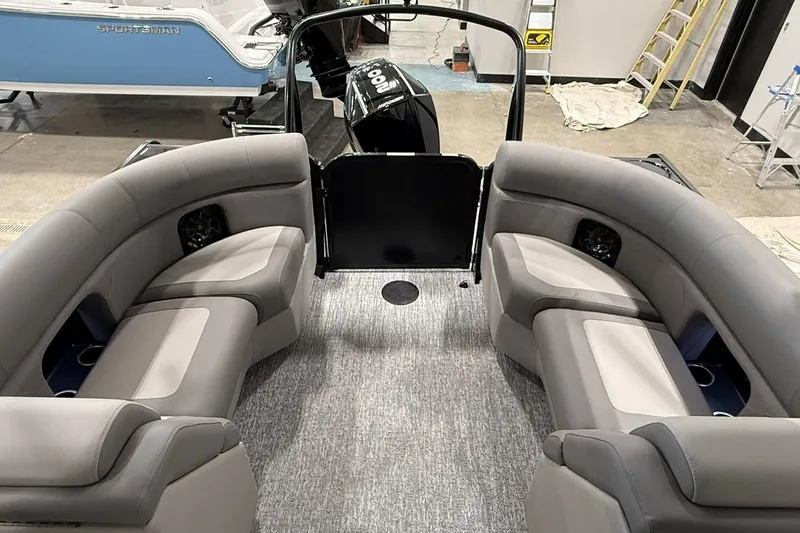 Slide: The Image of Interior of 2026 Premier 210 Sunsation RF-CL pontoon boat with gray seating. - 7