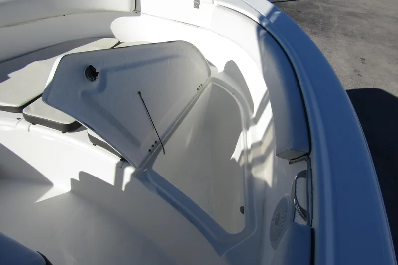 Slide: The Image of Open storage compartment on 2019 Clearwater Sportfishing Boats 2200 CC. - 11
