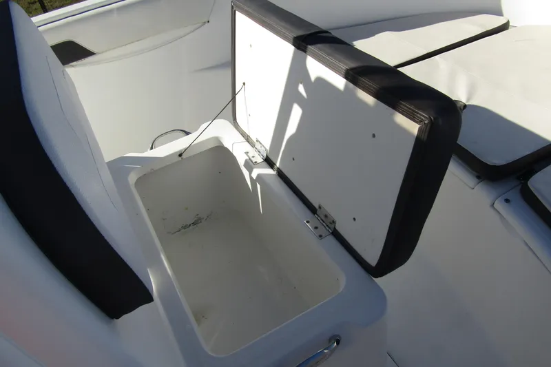 Slide: The Image of Open storage compartment on 2019 Clearwater Sportfishing Boats 2200 CC. - 14