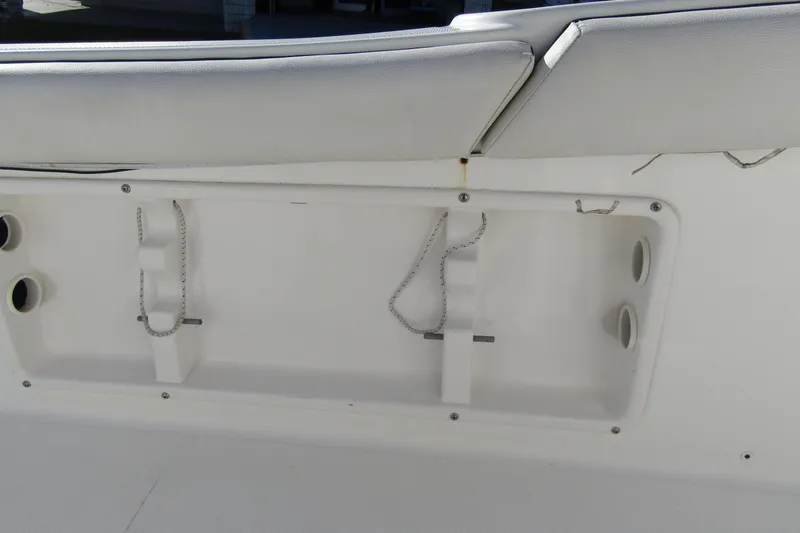 Slide: The Image of 2019 Clearwater Sportfishing Boats 2200 CC interior detail with storage compartment and seating. - 29