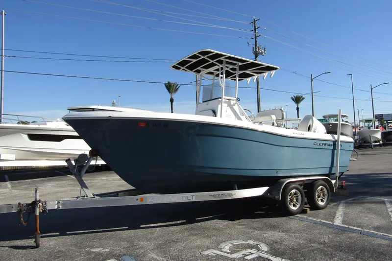 Slide: The Image of 2019 Clearwater Sportfishing Boats 2200 CC on trailer, parked outdoors. - 7