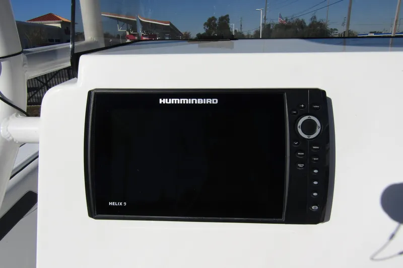 Slide: The Image of Humminbird Helix 9 fishfinder on 2019 Clearwater Sportfishing Boats 2200 CC dashboard. - 17