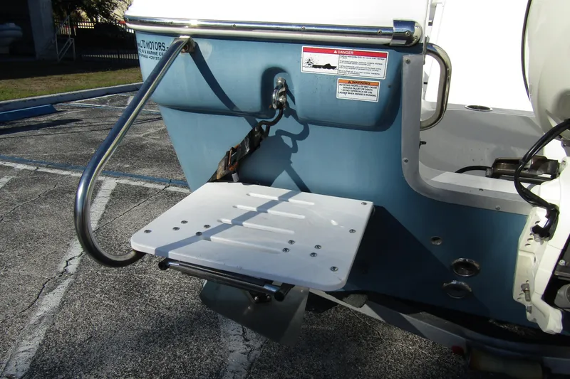 Slide: The Image of 2019 Clearwater Sportfishing Boats 2200 CC swim platform and ladder detail. - 2