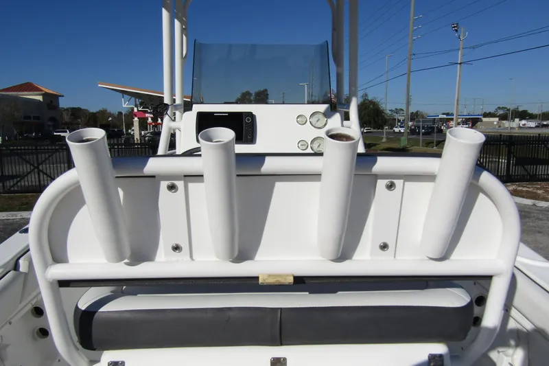Slide: The Image of 2019 Clearwater Sportfishing Boats 2200 CC with rod holders and control panel. - 27