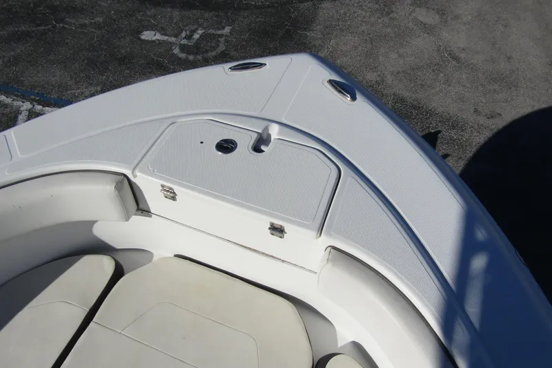 Slide: The Image of 2019 Clearwater Sportfishing Boats 2200 CC bow seating and storage compartment. - 8