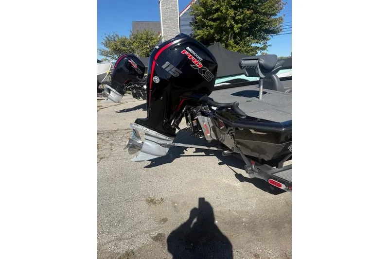 Slide: The Image of 2023 Vexus AVX1880 boat with Mercury Pro XS 115 engine, parked outdoors. - 4