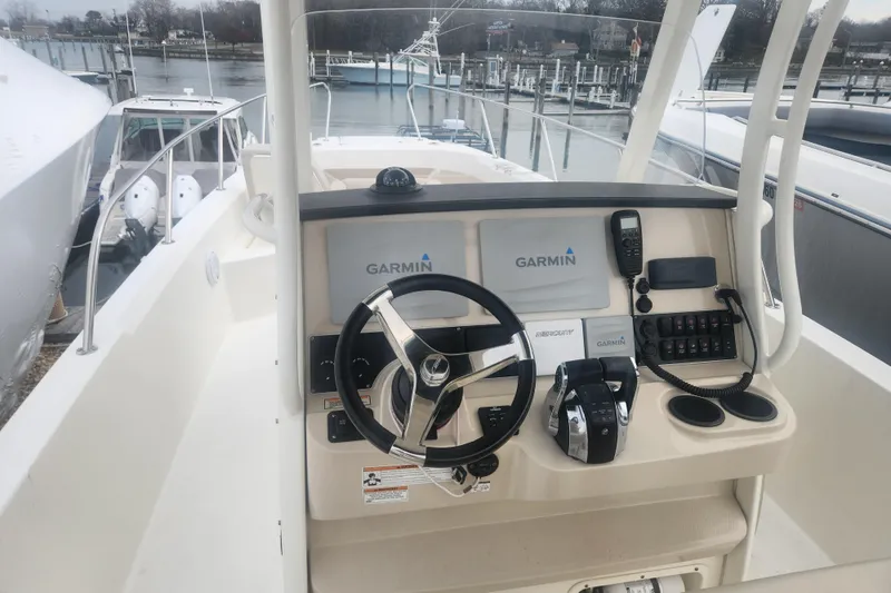 Slide: The Image of 2018 Boston Whaler 270 Dauntless boat console with Garmin navigation system. - 8