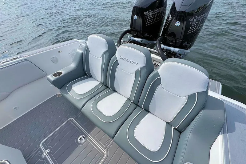 Slide: The Image of 2023 Concept 30' Cuddy Cabin boat with dual engines and stylish seating on water. - 10