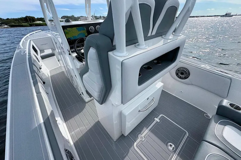 Slide: The Image of 2023 Concept 30' Cuddy Cabin boat interior with modern seating and navigation system. - 12