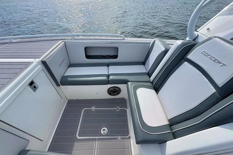 Slide: The Image of 2023 Concept 30' Cuddy Cabin boat interior with sleek seating and ocean view. - 18