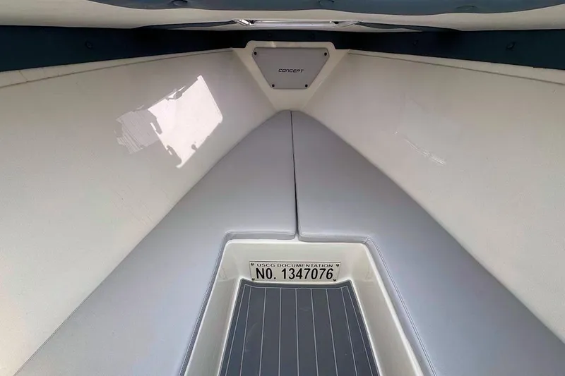 Slide: The Image of 2023 Concept 30' Cuddy Cabin interior with sleek design and USCG documentation number. - 20