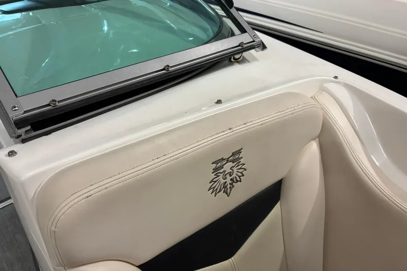 Slide: The Image of 2016 Chaparral 287 SSX boat interior with embroidered seat and windshield detail. - 20