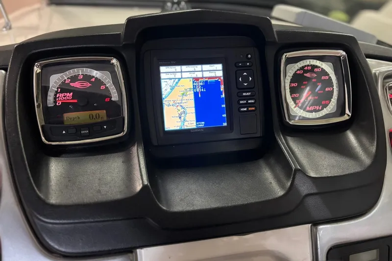 Slide: The Image of Dashboard of 2016 Chaparral 287 SSX boat with GPS and gauges. - 32