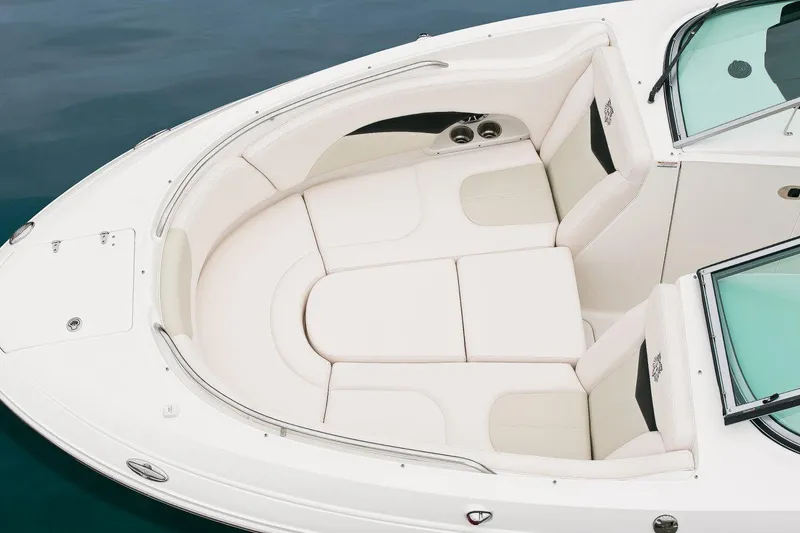 Slide: The Image of Manufacturer Provided Image: 2016 Chaparral 287 SSX boat with spacious white seating area. - 34