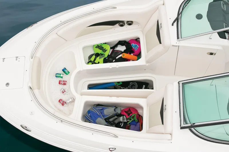 Slide: The Image of Manufacturer Provided Image: 2016 Chaparral 287 SSX boat with open storage compartments and gear. - 35