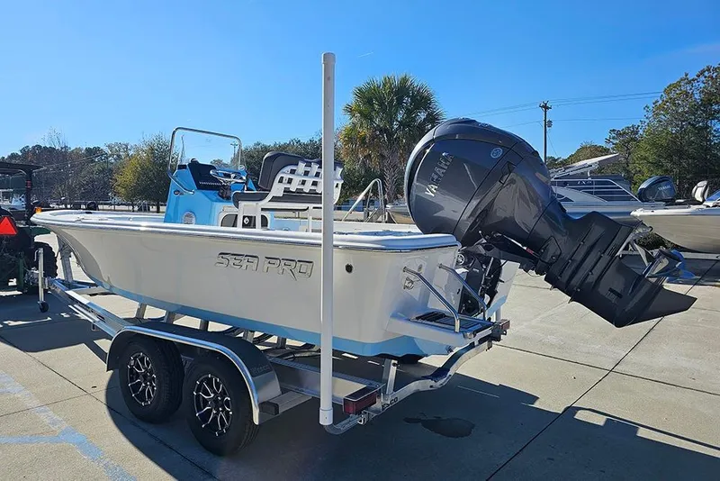Slide: The Image of 2026 Sea Pro 210 Bay boat on trailer with Yamaha outboard motor. - 7