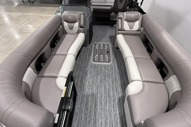 Slide: The Image of Luxurious interior of 2026 Premier 250 Intrigue RLO-CL pontoon boat with plush seating. - 10