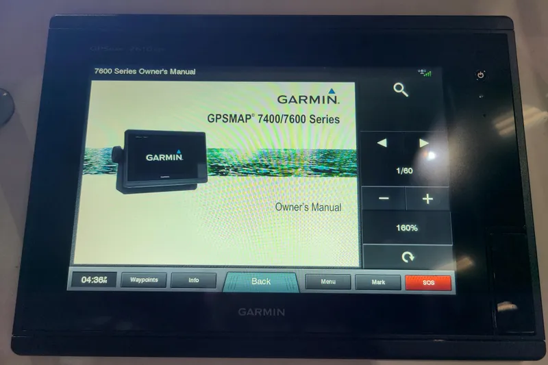 Slide: The Image of Garmin GPSMAP 7400/7600 Series owner's manual on Grady-White Freedom 235, 2017 model. - 12