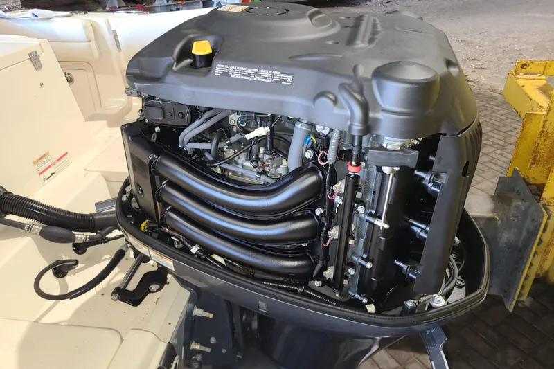 Slide: The Image of 2017 Grady-White Freedom 235 boat engine, detailed view of internal components. - 29