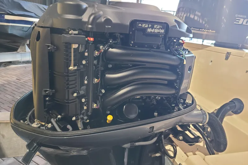 Slide: The Image of 2017 Grady-White Freedom 235 boat engine, detailed view of Yamaha outboard motor components. - 30