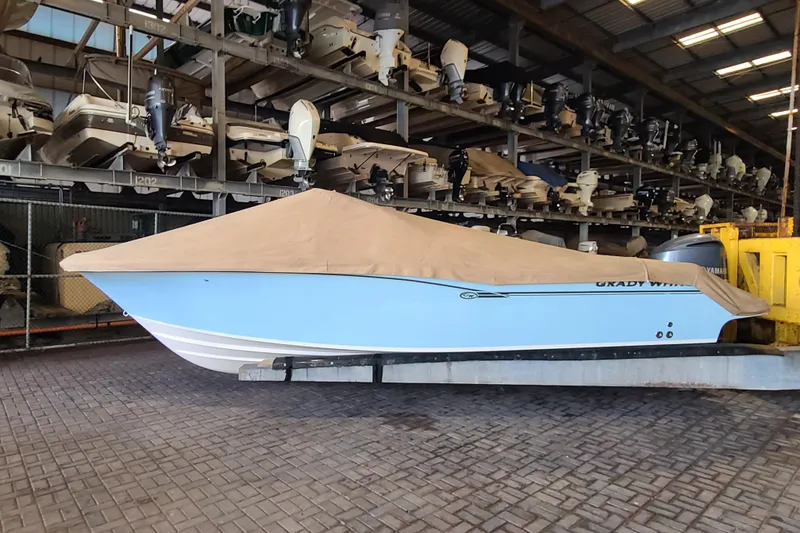 Slide: The Image of 2017 Grady-White Freedom 235 boat covered in storage facility. - 32